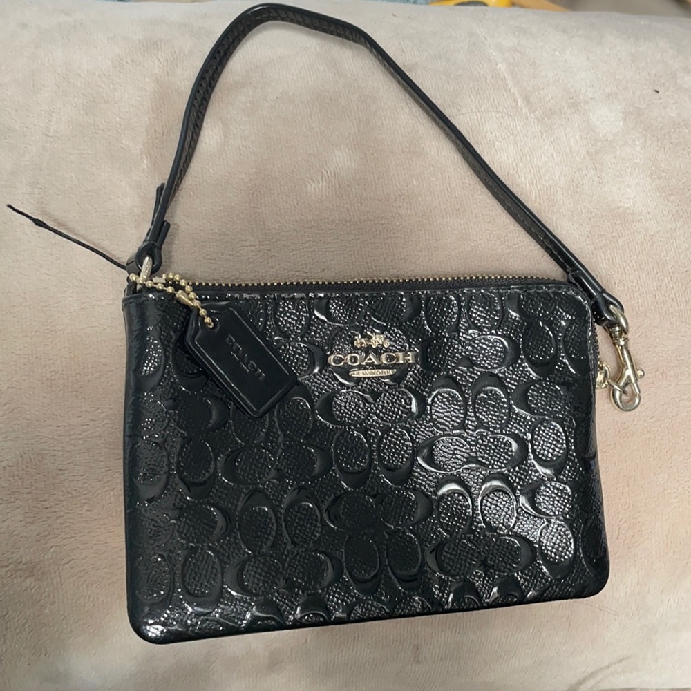 Coach black embossed logo wristlet Like New